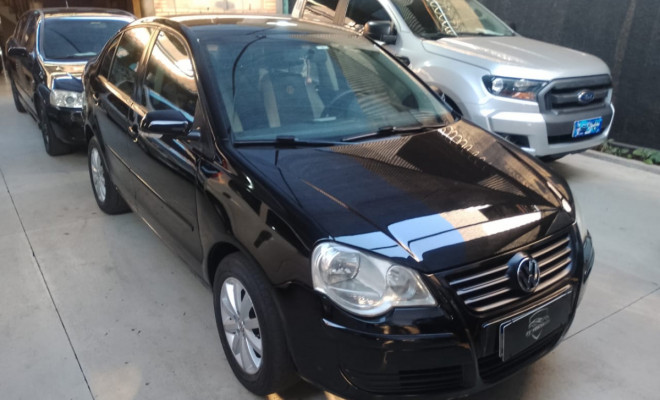 VW - VolksWagen Polo 1.6 E-Flex 8V 5p 2011 Flex-0