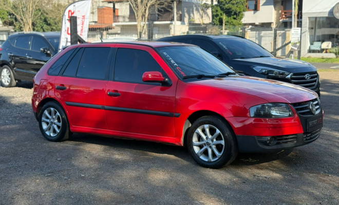VW - VolksWagen Gol (novo) 1.0 Mi Total Flex 8V 4p 2013 Flex-0
