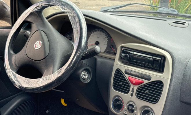 Fiat Palio ELX 1.0 Fire/30 Anos F. Flex 8V 4p 2010 Flex-3